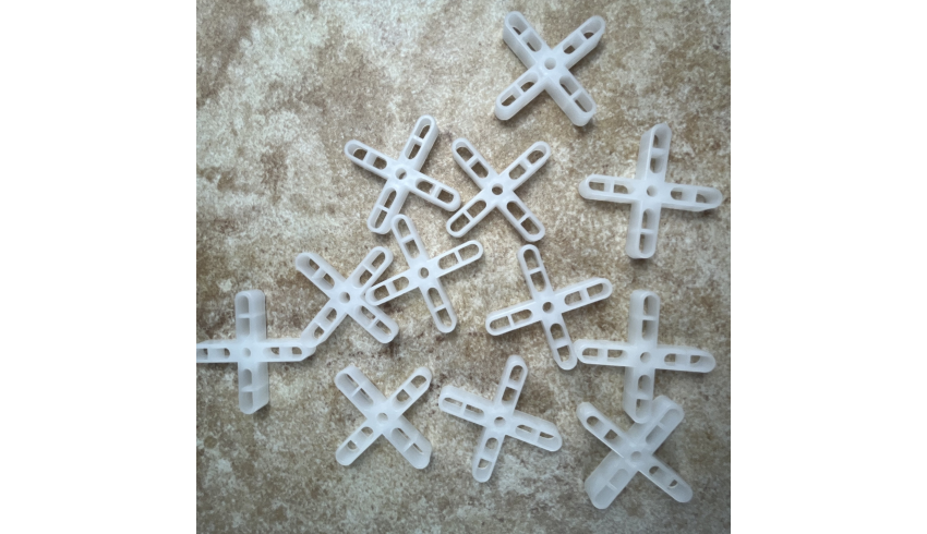 Cross shaped spacer